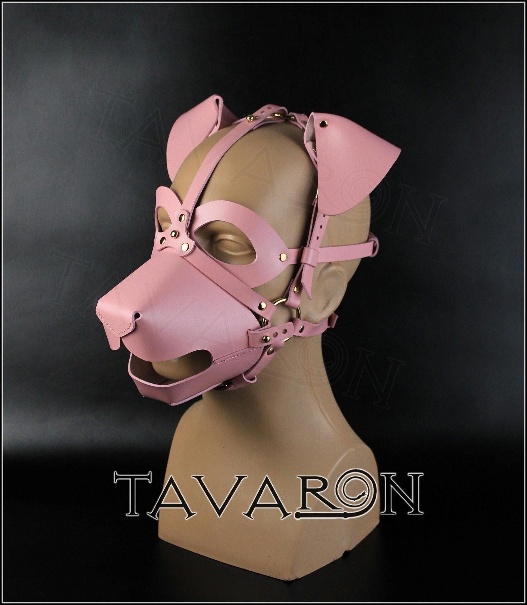 Pink leather dog mask with an open mouth muzzle